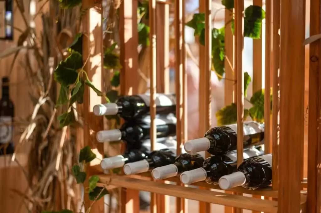 Wine Rack with plants background